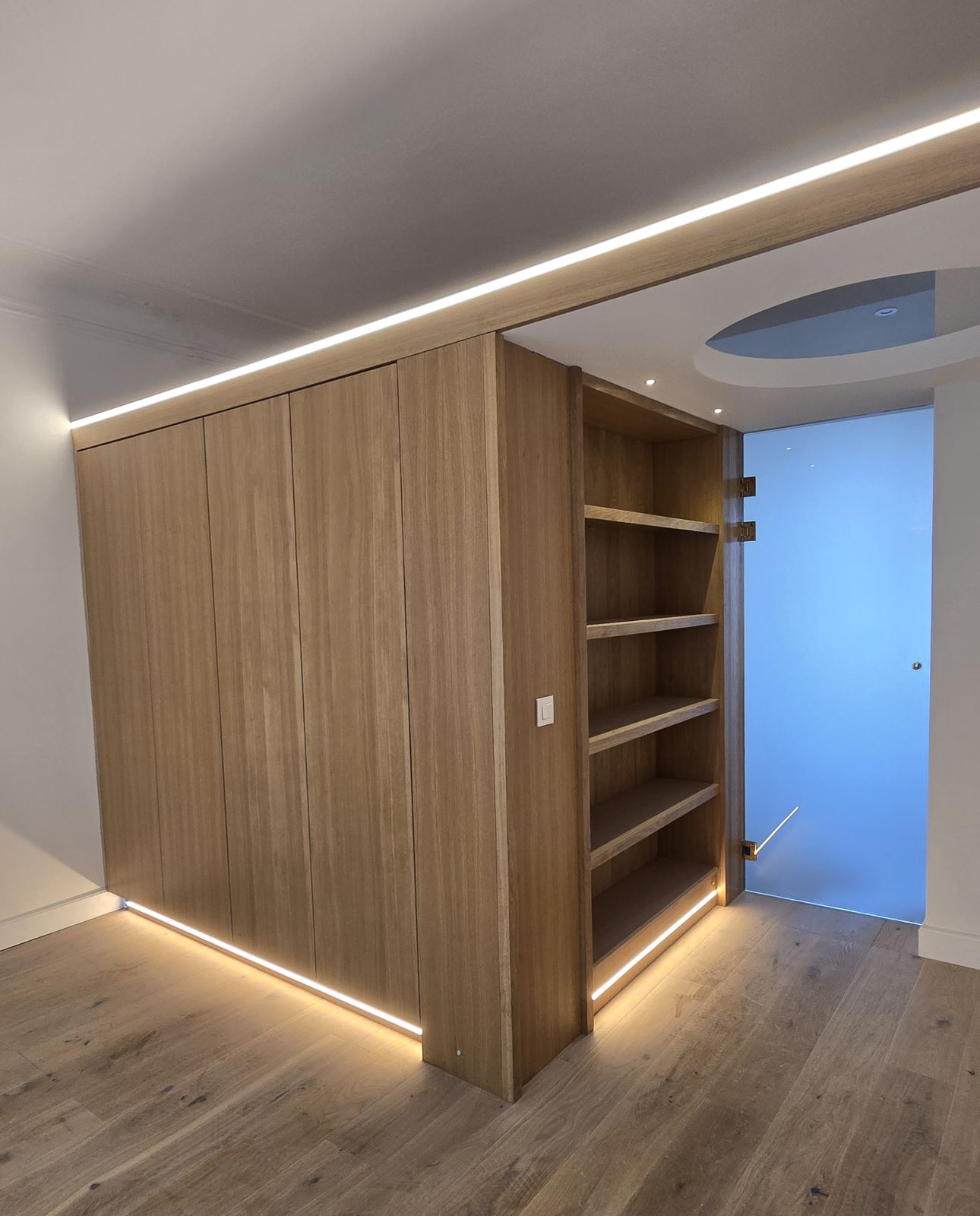 Bespoke oak cabinetry with integrated LED lighting